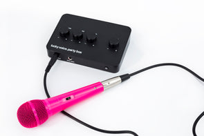 lucky voice pink wired karaoke microphone plugged into karaoke kit
